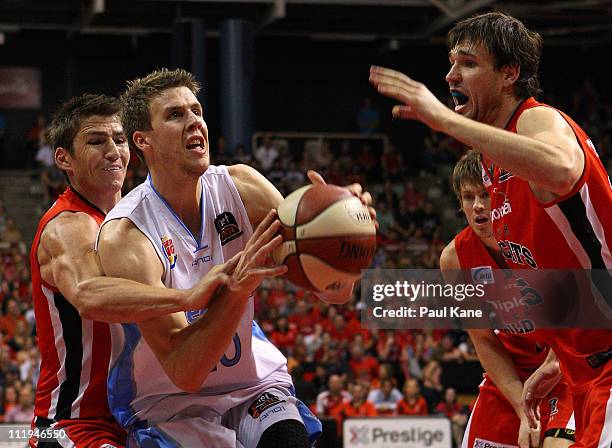 Thomas Abercrombie of the Breakers is fouled by Damian Martin of the Wildcats during game two of the NBL Semi Final series between the New Zealand...