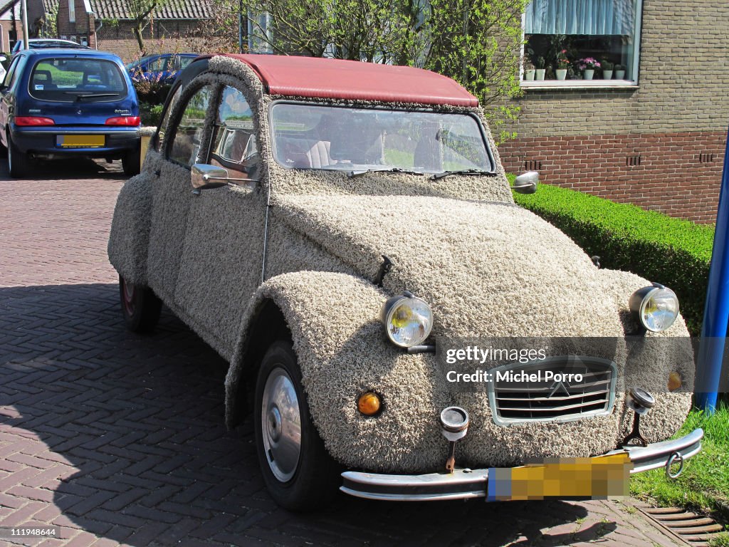 Iconic 2CV Citroen Car Covered With Carpet