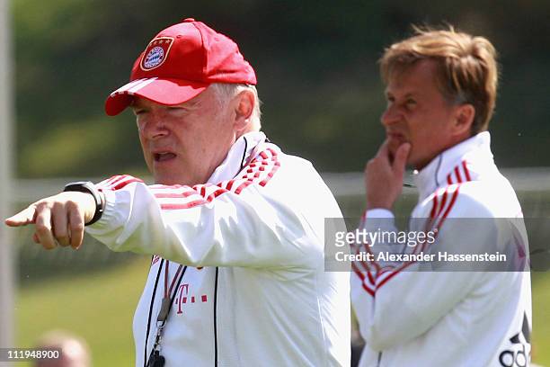 New head coach Andries Jonker looks on whilst his assistent coach Hermann Gerland gives instructions to his team during the Bayern Muenchen training...