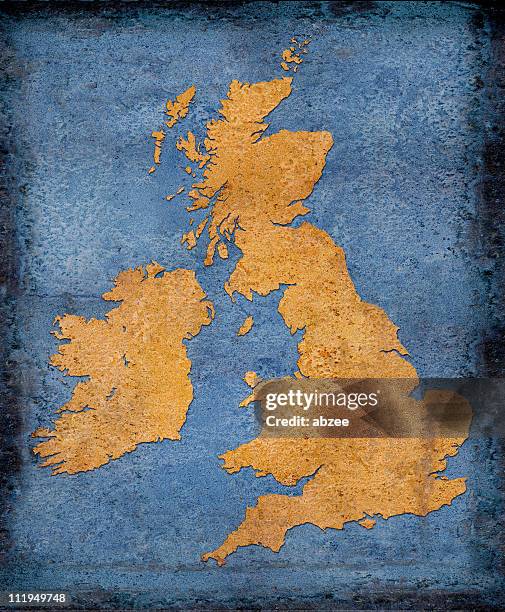 rusty uk and ireland on blue toned background - scotland map stock pictures, royalty-free photos & images