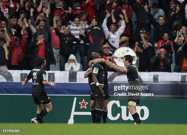 Yannick Nyanga, is mobbed by team mates after scoring the match winning try in the last minute of extra time during the Heineken Cup quarter final...