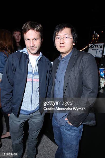 Breckin Meyer and Masi Oka attend the 42 Vodka celebration for the 100th episode of Robot Chicken on April 9, 2011 in Los Angeles, California