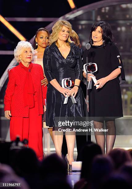 The cast of "The Facts Of Life" Charlotte Rae, Kim Fields, Lisa Whelchel and Nancy McKeon accept the Pop Culture Award onstage at the 9th Annual TV...