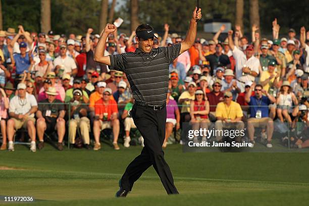 Charl Schwartzel of South Africa celebrates his two-stroke victory on the 18th green during the final round of the 2011 Masters Tournament at Augusta...