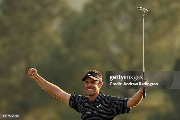 Charl Schwartzel of South Africa celebrates his two-stroke victory at the 2011 Masters Tournament at Augusta National Golf Club on April 10, 2011 in...