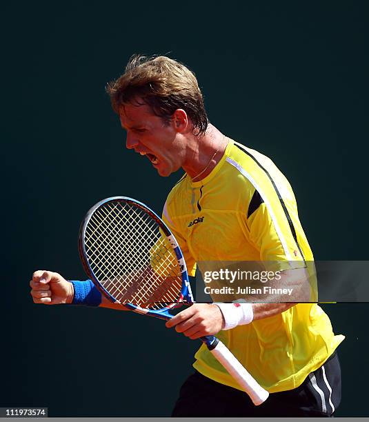Daniel Gimeno-Traver of Spain celebrates winning the first set against Santiago Giraldo of Columbia during Day Two of the ATP Masters Series Tennis...