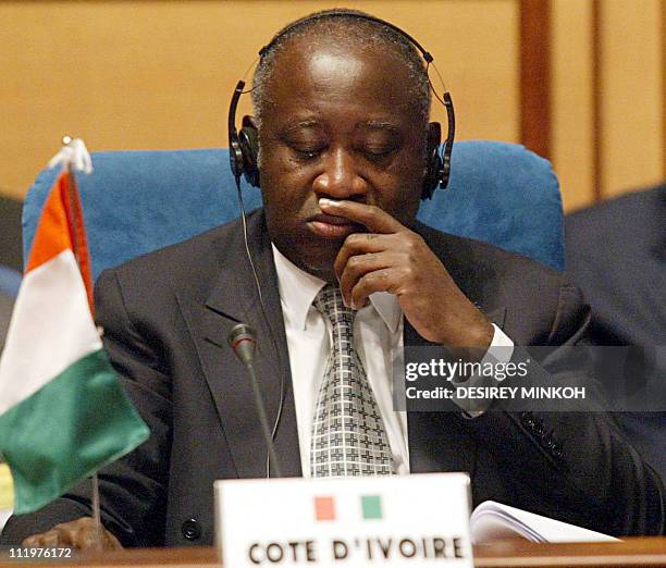 President Laurent Gbagbo of Ivory Coast attends 10 January 2004 in Libreville the opening of a two-day meeting, the first of the African Union's...