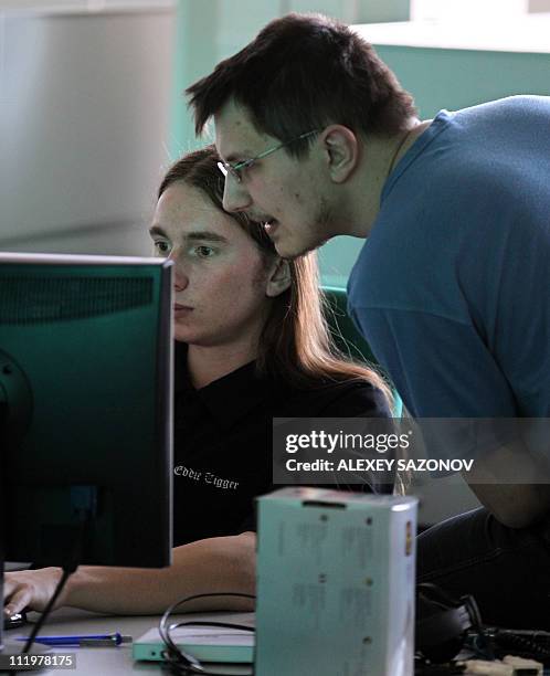 Employees of anti-virus program development Kaspersky Lab work at their company's offices in Moscow, on March 10, 2011. Recently, the American...