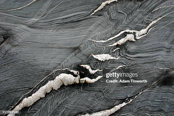 rock texture - black rock stock pictures, royalty-free photos & images