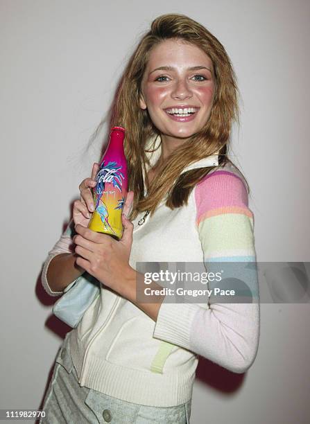 Mischa Barton holding a specially designed Coke bottle by Matthew Williamson