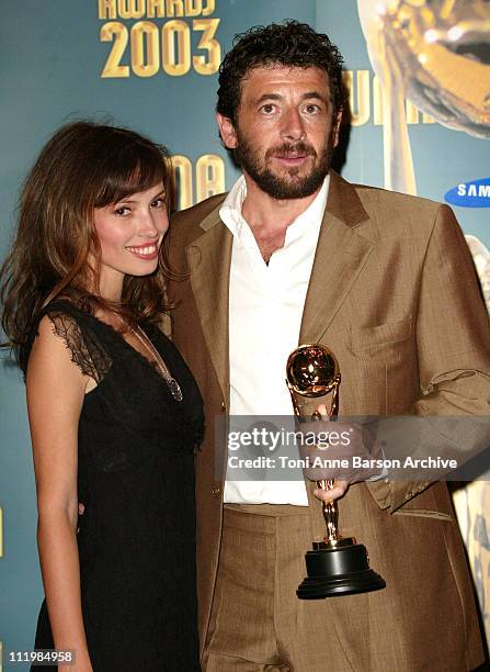 Jane March and Patrick Bruel during 2003 Monte Carlo World Music Awards - Press Room at Monte Carlo Sporting Club in Monte Carlo, Monaco.