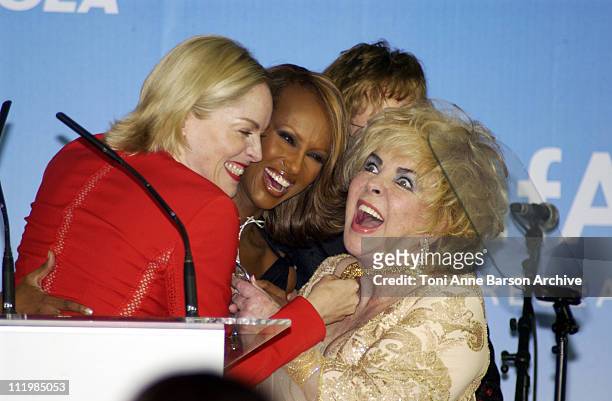 Sharon Stone, Iman & Dame Elizabeth Taylor during Cannes 2002 - amfAR's Cinema Against AIDS Gala sponsored by Motorola and co-sponsored by De Beers -...