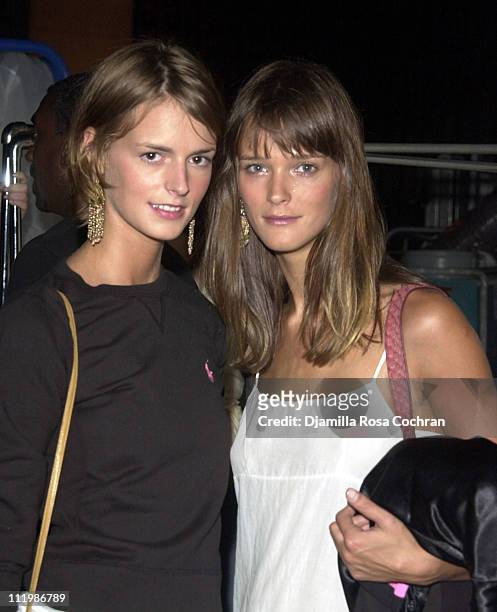 Carmen Kass and guest during Mercedes-Benz Fashion Week Spring Collections 2003 - Ralph Lauren Show - Front Row at Cooper Hewitt Museum in New York...
