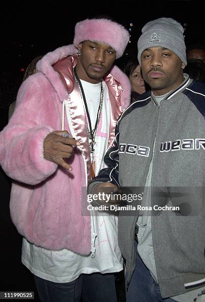 Cam'ron and Damon Dash during Mercedes-Benz Fashion Week Fall 2003 Collections - Baby Phat - Front Row and Backstage at Bryant Park in New York City,...