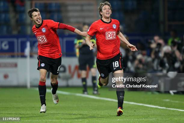 Peter Niemeyer of Berlin celebrates the first goal with Nikita Rukavytsya of Berlin during the Second Bundesliga match between VfL Bochum and Hertha...