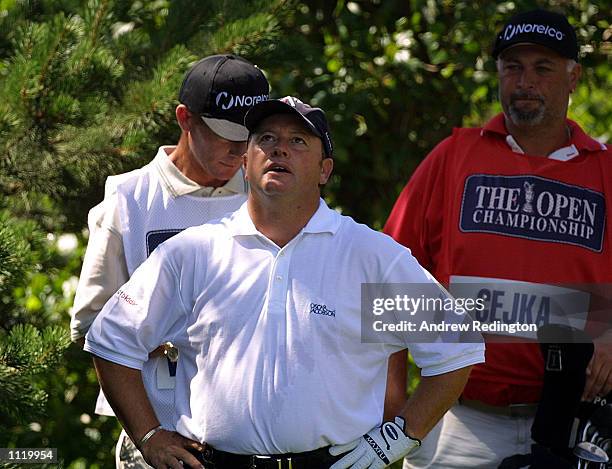 Ian Woosnam of Wales looks on is despair after being told by PGA tour official John Paramor that he has too many clubs in his bag and will be given a...