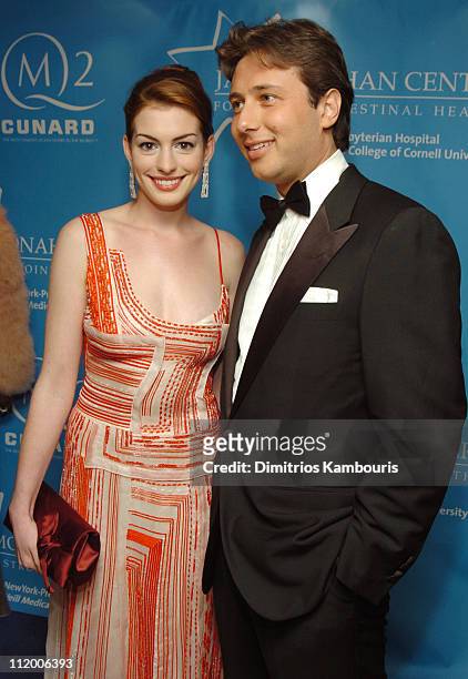 Anne Hathaway and guest during Entertainment Industry Foundation's Colon Cancer Benefit on the QM2 - Red Carpet at Queen Mary 2 in New York City, New...