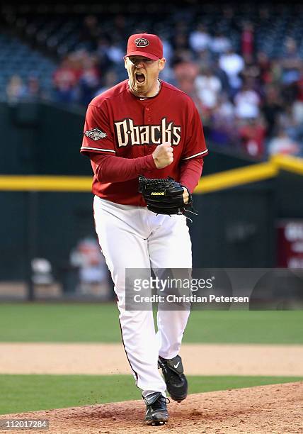 Relief pitcher J.J. Putz of the Arizona Diamondbacks celebrates after defeating the Cincinnati Reds in the Major League Baseball game at Chase Field...