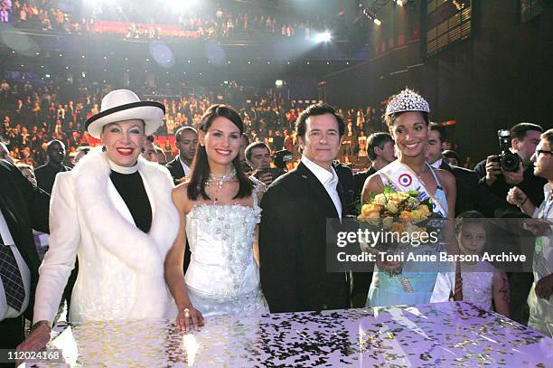 Genevieve de Fontenay, Laetitia Bleger - Miss France 2004, Francis Huster, Cindy from Normandy - Miss France 2005, and Olivier de Fontenay with...