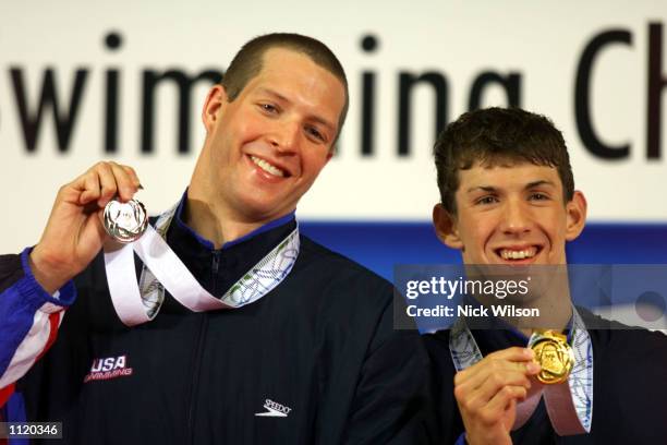 Tom Malchow and Michael Phelps of the USA pose with their Sivler and Gold medals after the Mens 200m Butterfly at the Marine Messe Pool during the...