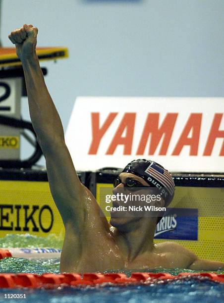 Michael Phelps of the USA wins gold in the Mens 200m Butterfly in a new world record time of 1:54.58 at the Marine Messe Pool during the World...