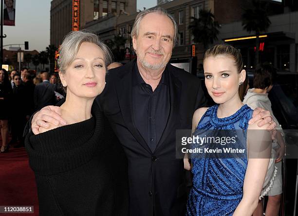 Iya Labunka, director Wes Craven, and actress Emma Roberts arrive at the premiere of The Weinstein Company's "Scream 4" Presented by AXE Shower held...