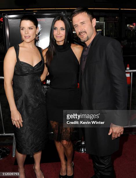 Actors Neve Campbell, Courteney Cox, and David Arquette arrive at the premiere of The Weinstein Company's "Scream 4" Presented by AXE Shower held at...
