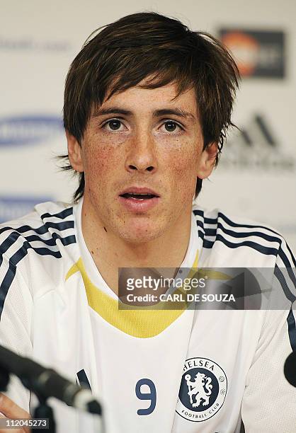 Chelsea's new signing, Spanish striker Fernando Torres attends a press conference at Chelsea's training grounds in Cobham, Surrey, on February 4,...