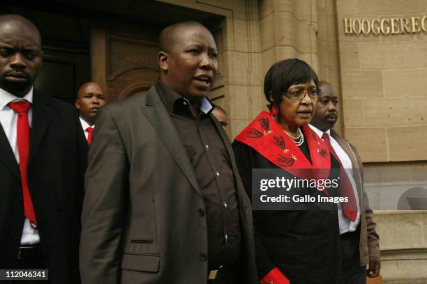 Youth League president Julius Malema and ANC stalwart Winnie Madikizela-Mandela leave the High Court on April 11, 2011 in Johannesburg, South Africa....