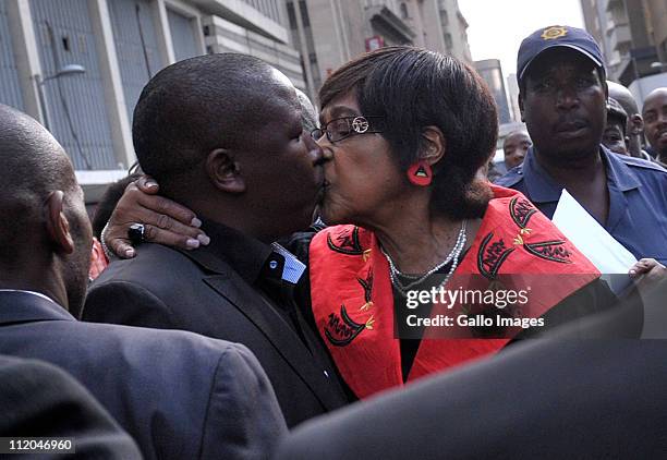 Youth League president Julius Malema is embraced by ANC stalwart Winnie Madikizela-Mandela outside the High Court on April 11, 2011 in Johannesburg,...