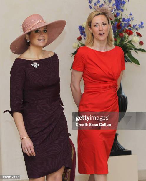 German First Lady Bettina Wulff welcomes Princess Maxima of the Netherlands at Bellevue Presidential Palace on April 12, 2011 in Berlin, Germany. The...