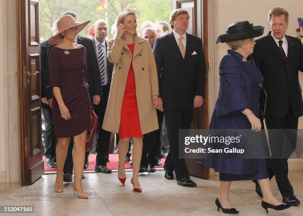German First Lady Bettina Wulff and German President Christian Wulff welcome Princess Maxima , Prince Willem-Alexander and Queen Beatrix of the...