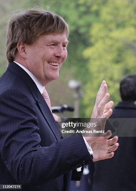 Prince Willem-Alexander of the Netherlands greets school children at Bellevue Presidential Palace on April 12, 2011 in Berlin, Germany. The Dutch...