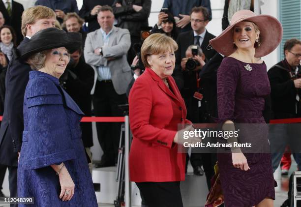 German Chancellor Angela Merkel welcomes Queen Beatrix of the Netherlands and Princess Maxima of the Netherlands upon their arrival at the...