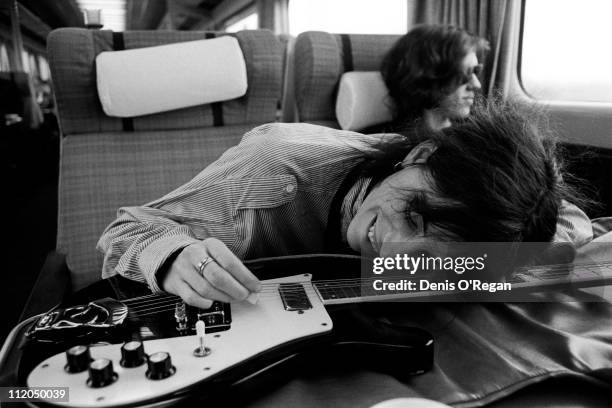 Singer and songwriter Patti Smith on a train from Manchester to London, 1978.