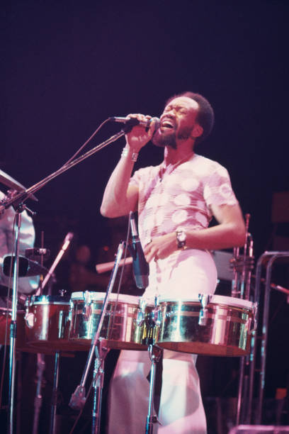 Maurice White performing with Earth, Wind & Fire, in concert, circa 1980.
