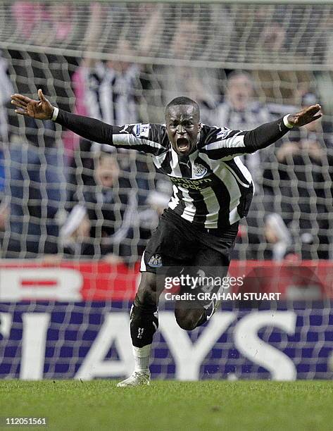 Newcastle United's Ivorian midfielder Cheik Tiote celebrates scoring their equalizing goal during the English Premier League football match between...