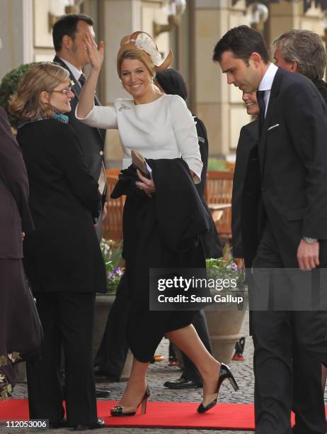 Princess Maxima of the Netherlands waves upon her arrival at the Adlon Hotel on April 12, 2011 in Berlin, Germany. The Dutch royals, including Queen...