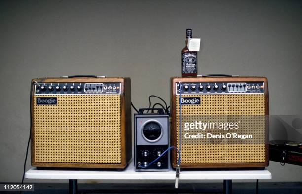Two Boogie amplifiers, a Conn Strobotuner and bottle of Jack Daniels backstage at a Rolling Stones concert, 1982.