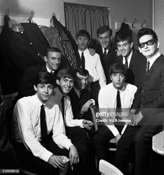 The Beatles pose with Roy Orbison and Gerry And The Pacemakers backstage in their dressing room during a UK tour, L-R: Paul McCartney, Freddie...