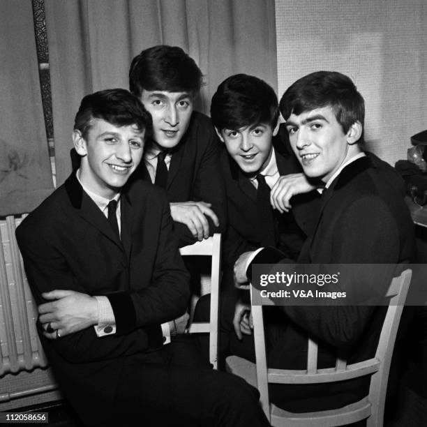 The Beatles pose for an eraly group portrait, backstage, Ringo Starr, John Lennon, Paul McCartney, George Harrison, 1962.