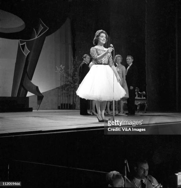Connie Francis, performs on stage on a TV show, 1959.