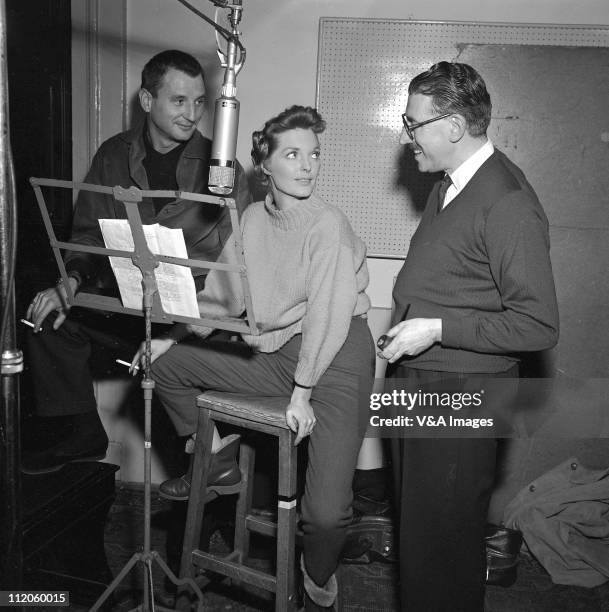 Julie London, posed, in recording studio, 1957.
