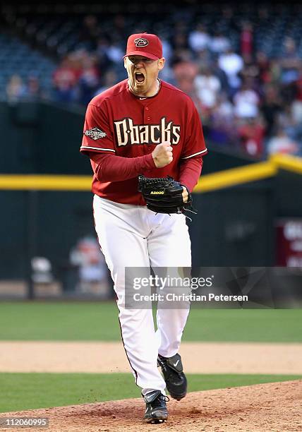 Relief pitcher J.J. Putz of the Arizona Diamondbacks celebrates after defeating the Cincinnati Reds in the Major League Baseball game at Chase Field...