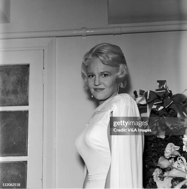 Peggy Lee, posed, backstage, 1961.