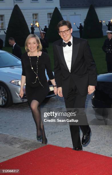 German Family Minister Kristina Schroeder and husband Ole Schroeder arrive to a state banquet given in the honour of Queen Beatrix, Prince...