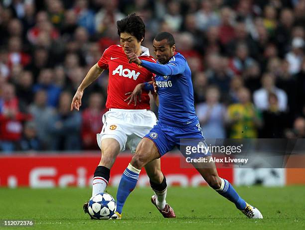 Ashley Cole of Chelsea tussles for posession with Ji-Sung Park of Manchester United during the UEFA Champions League Quarter Final second leg match...