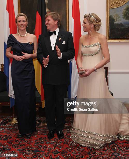 Princess Maxima , Prince Willem-Alexander of the Netherlands and German First Lady Bettina Wulff attend a state banquet given in honour of the...