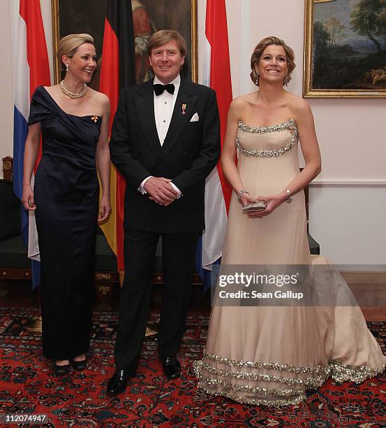 Princess Maxima , Prince Willem-Alexander of the Netherlands and German First Lady Bettina Wulff attend a state banquet given in honour of the...