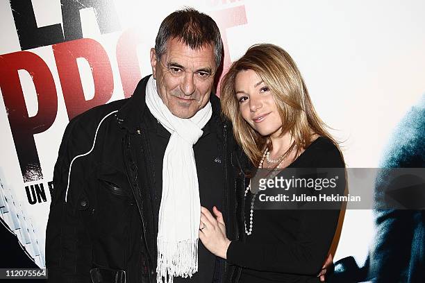 Jean-Marie Bigard and his girlfriend Lola Marois attend 'La Proie' Paris premiere at UGC Cine Cite Bercy on April 12, 2011 in Paris, France.